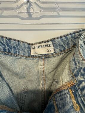 We The Free faded light blue denim jeans